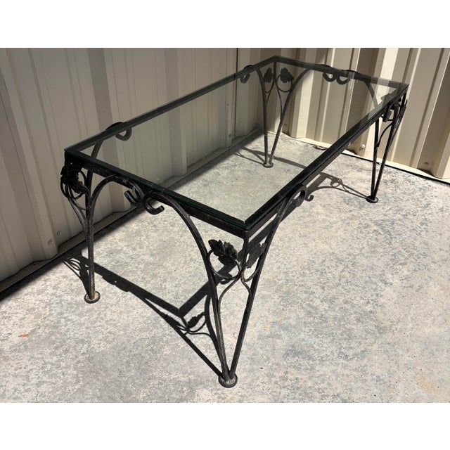 Awesome vintage wrought iron and glass coffee table for a patio,porch or sunroom. This table was purchased new in 1969 and...