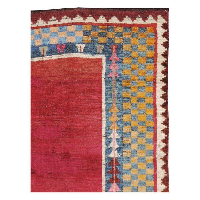 An antique Persian Gabbeh carpet from the first quarter of the 20th century. Measures: 4' 4" x 6' 2".