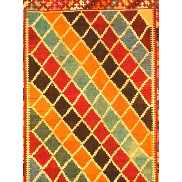 Vintage Persian Kilim Rug. Hand knotted. 100% Lamb's wool and lamb's wool pile. Flat weave. This collection complements...