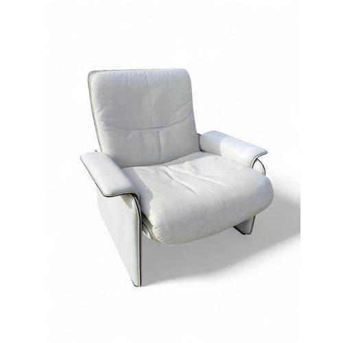 Specifications The brand Introducing a distinguished De Sede armchair with matching ottoman, epitomizing modern elegance...