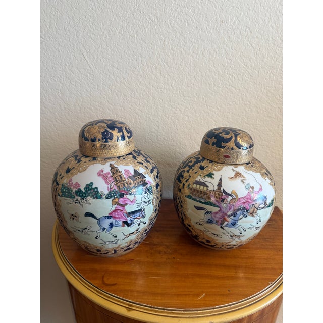 Glass Vintage Blue and Gold Porcelain Urns With Equestrian Hunt Scene (A Pair) For Sale - Image 7 of 9