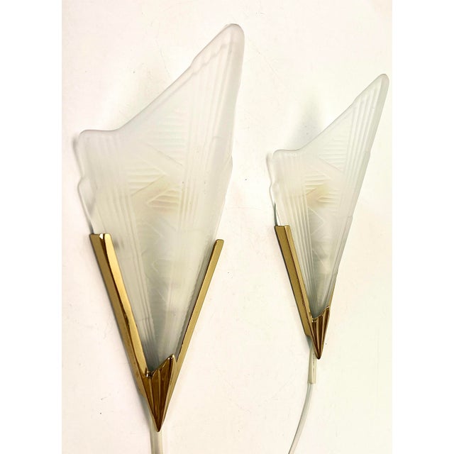 Art Deco style pair of wall lights or sconces in triangle shape from frosted glass, brass and metal in Degue style,...