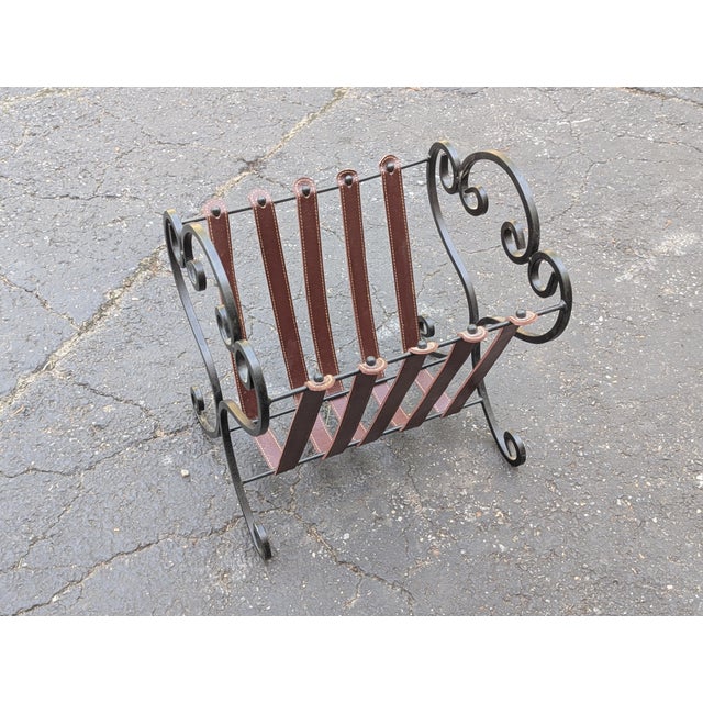 Enhance your space with this classic vintage magazine and book holder. Crafted with a black wrought iron frame featuring...
