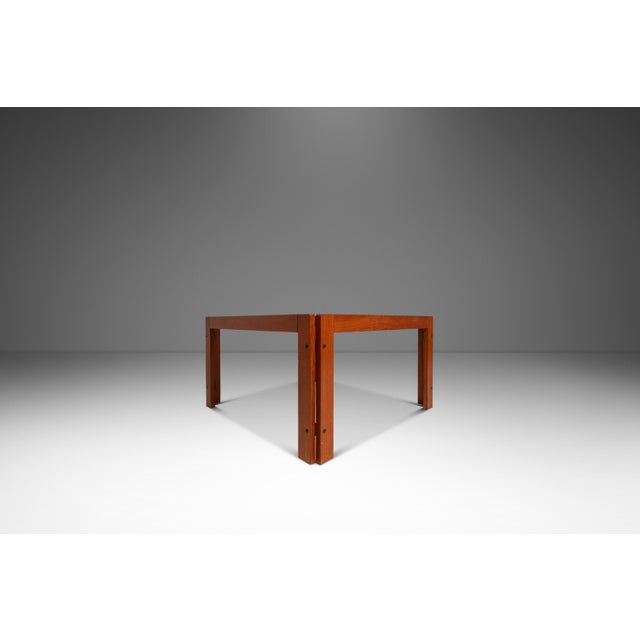 This elegant Mid Century Modern coffee table draws direct inspiration from the iconic designs of Afra & Tobia Scarpa for...