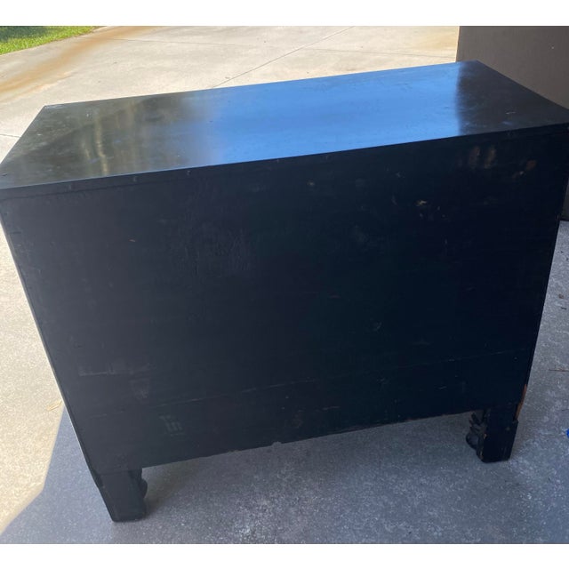 Ebony black vintage dresser. Has 4 drawers. 2 pillar legs on the front. Dresser has a few scratches and needs tlc.