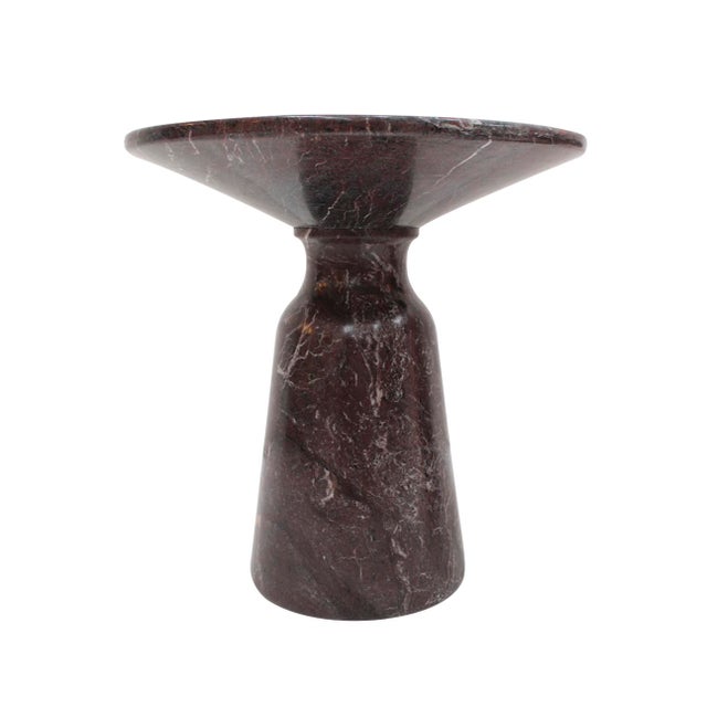 The tables were crafted from Rosso Levanto marble, a material known for its distinctive dark red color with striking white...