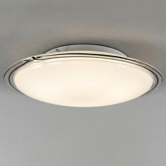 A true luminous sculpture that redefines your ceilings with the boldness of 1970s design. This rare and imposing ceiling...
