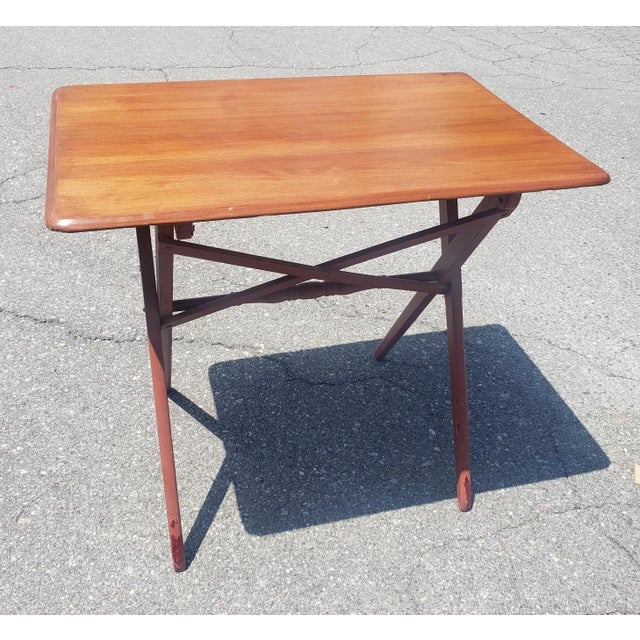 A Mid-Century Stained and painted Maple Adjustable Height Folding Table Measures 30"W x 19"D x Adjustable of 23 "H and 26"H