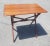 A Mid-Century Stained and painted Maple Adjustable Height Folding Table Measures 30"W x 19"D x Adjustable of 23 "H and 26"H