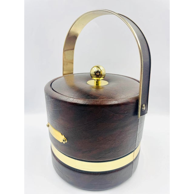 “Home accessories… Beautifully in tune with today's Good Life!” ~ Georges Briard This truly special ice bucket from one of...