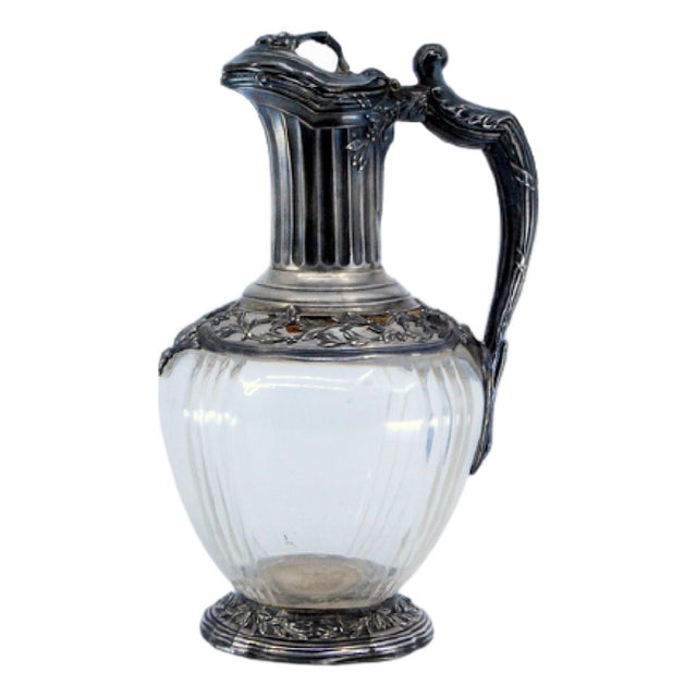 Wine Jug in Cut Glass and Silver on the Lid, Neck, Handle and Base with Reliefs For Sale