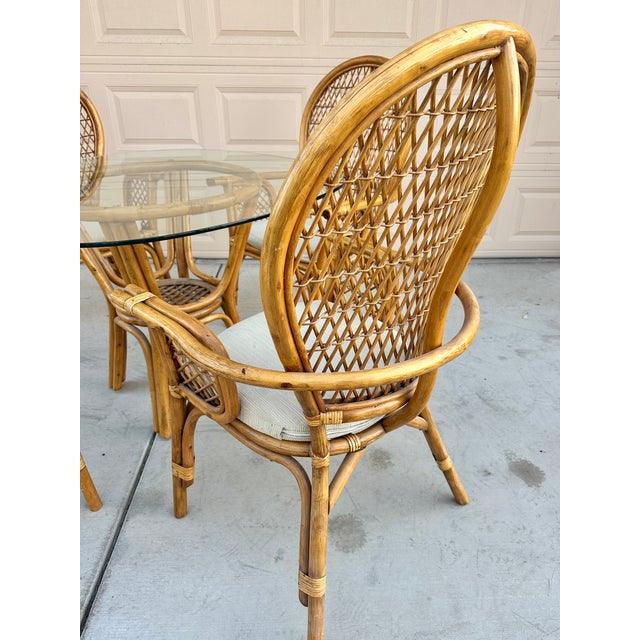 An exceptional, highly architectural vintage 1970s 5-piece indoor/covered patio dining set executed in the iconic manner...