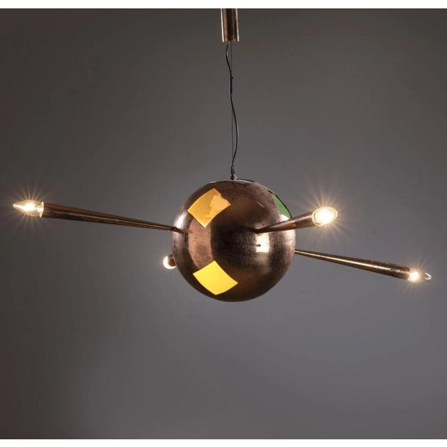Chandelier in Copper Brass and Colored Glass 4 Copper Cones, in Very Good conditions. Designed 1920 to 1949 Up to 250V...