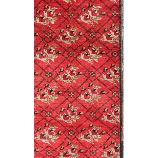 Measures: 8' x 10'8 Hand-Knotted in Turkey, this one-of-a-kind vintage Konya rug creates a dynamic aesthetic through rich...