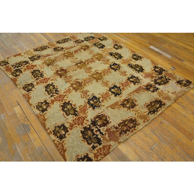 Antique European Needlepoint Rug, size: 4'8" x 5'6". This nineteenth-century English Needlepoint rug is a magnificent...