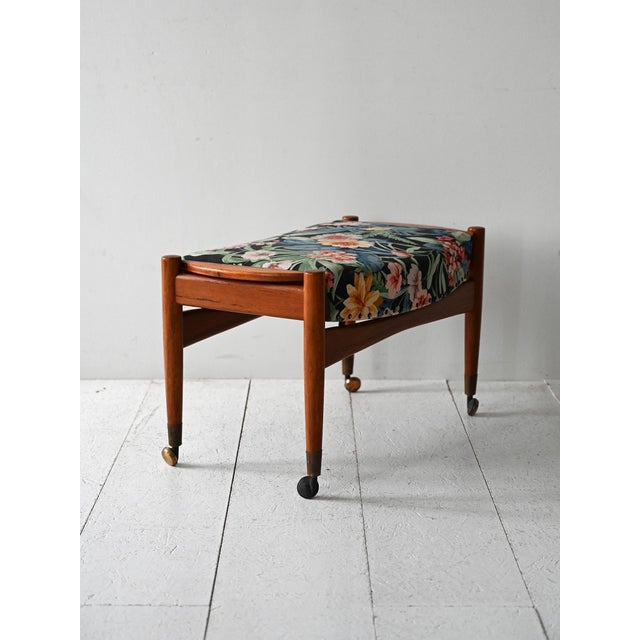 Vintage footstool with wooden frame and wheels, upholstered in original Josef Frank floral fabric. Scandinavian footstool...