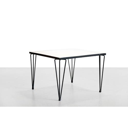 Very rare coffee table designed by Rudolf Wolf for Rohé Noordwolde. Most likely one of his first designs. Made of a black...
