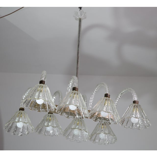 Extraordinary Murano chandelier from the Barovier and Toso glassworks in 8 bullicante glass arms in a brass structure...