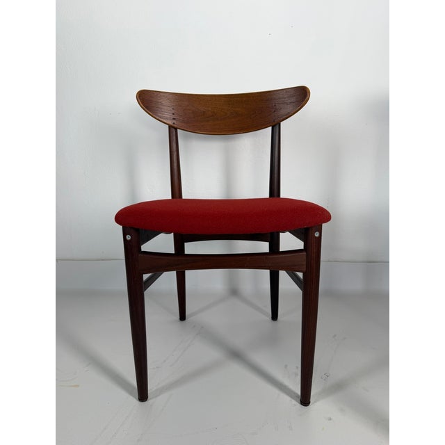 Original pair of Danish chairs crafted from teak, dating from the 1960s. Their lightweight construction, slender tapered...