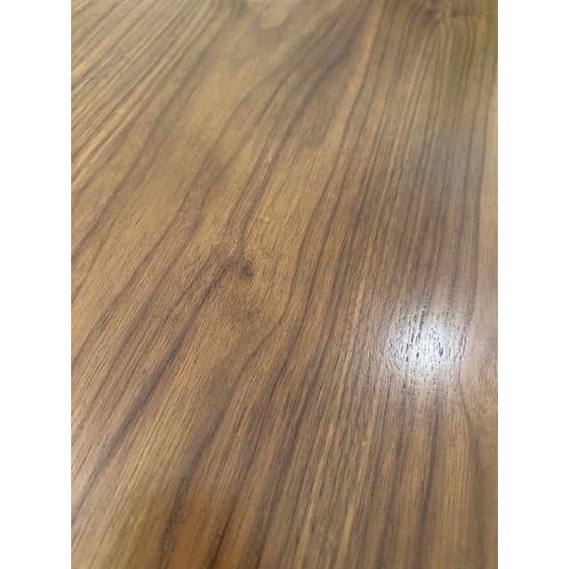 This is a vintage Fritz Hansen table, signed and professionally refinished. This table is 57" in diameter and perfect for...