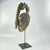 The Gelede mask, originating from the Yoruba people living along the southwestern Nigerian and Beninese border, showcases...