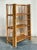 This charming vintage etagere is a quintessential example of tropical and Boho Chic design, crafted entirely from natural...