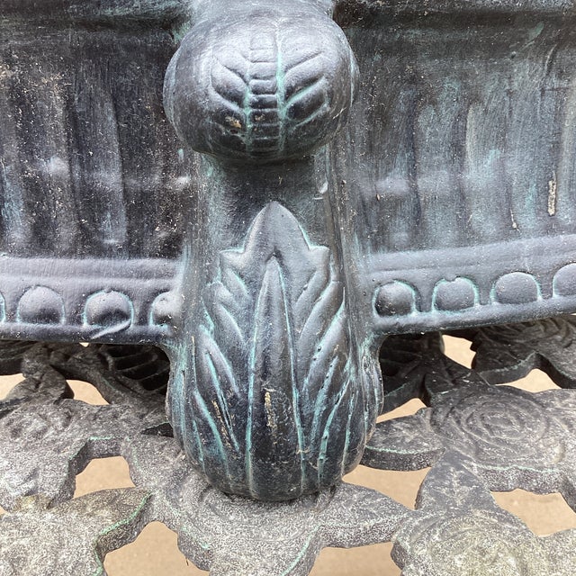 This vintage ceramic footed jardiniere/planter with a neoclassical design is a charming and elegant addition to any room....