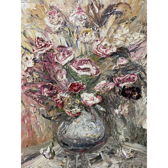 Who says you can’t hang a painting bursting with flowers in an all-neutrals room? At no risk of disturbing the peace,...