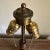 Antique carved wood barley twist style lamp base is topped with a 2-light cluster with pull chains. It has been rewired...