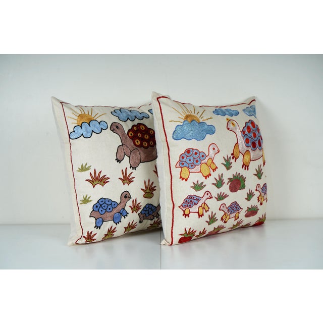 Uzbek Suzani Pillow Cover Elevate your home decor with our Turkish Suzani Pillow Cover, featuring exquisite vintage Uzbek...