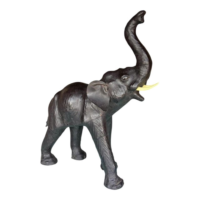 Leather Elephant, Circa 1950. Leather elephant, circa 1950, made of hollow wood, filled with straw, and covered in...