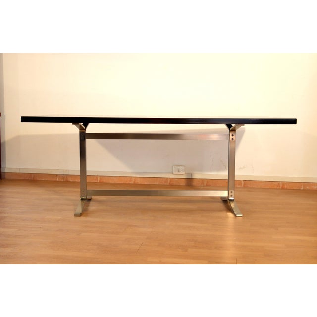 Dining or conference table designed by Gianni Moscatelli for Formanova, circa 1965. Large, with a chromed metal frame and...