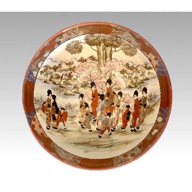 An exceptional, monumental Japanese Kutani porcelain presentation punch bowl from the Meiji period. This rare, exhibition-...