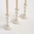 Traditional style in a contemporary fabrication, this set of taper holders is designerinspired. Made of enamel coated...