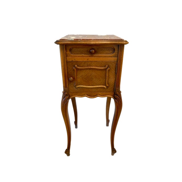 Antique French Louis XV style walnut night stand side table. Serpentine top fitted with original rouge marble insert....