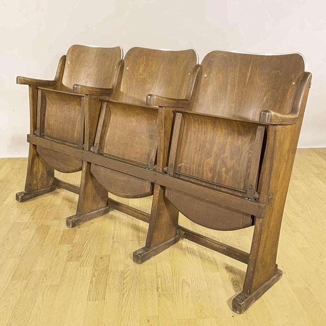 This set of three cinema and theater chairs from the 1950s is a splendid example of vintage industrial design, perfect for...