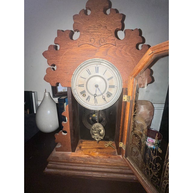 Add a touch of late Victorian charm to your mantle or shelf with this stunning "Lily" parlor clock from the venerable E....