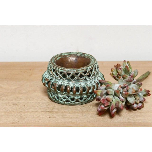 This captivating ceremonial bangle, crafted in Cameroon between the early and mid-20th century, served as currency for the...