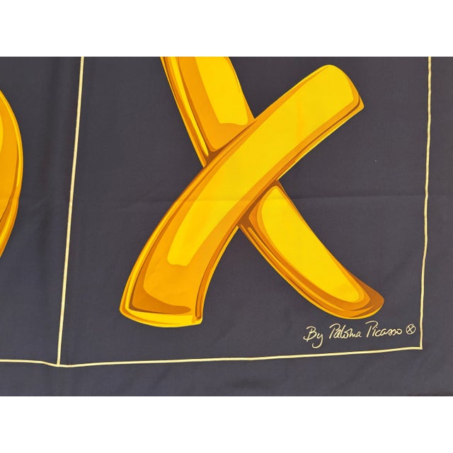 Paloma Picasso "XOXO" Black and Gold Silk Scarf. Paloma Picasso wonderfully bold and whimsical "XOXO" "Love and Kisses "...