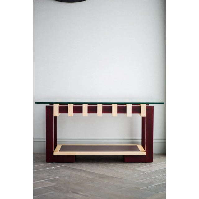 The Artisanal Ant coffee table is made from hardwoods, walnut and maple with a 1/2" thick polished tempered glass top. Its...