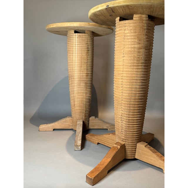 This pair of French Art Deco side tables is styled after the work of Charles Dudouyt (1885–1946), embodying the...