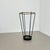 This original vintage umbrella stand element was produced in the 1950s in France. It is made of solid metal and brass....