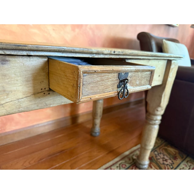 Antique table purchased in Tucson, Arizona 25-30 years ago. Has served me well all these years.
