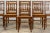 A grand set of twelve mid-19th century French Louis XIII style dining chairs, sourced from Provence, France. Each chair is...