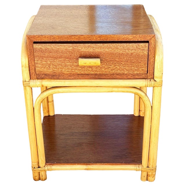 This beautifully restored rattan and mahogany nightstand blends style and vintage charm with modern comfort. Made in 1950,...