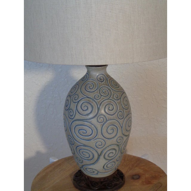 Unusual Art Nouveau Style table lamp. Embossed swirled design. with robin's nest blue inlay, 13 inches tall 6 inches in...