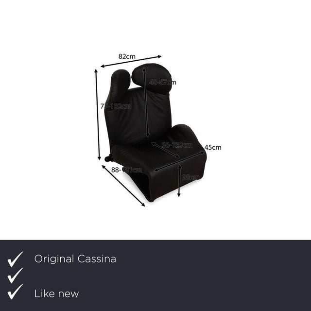 The Wink armchair from Cassina is reupholstered in dark gray vegan leather and stands on small, black feet. The practical...