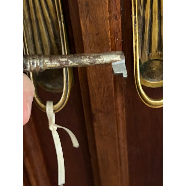 Burnt Umber French Louis XV Style Tri-Fold Mirrored Armoire Wardrobe Cabinet, Carved Floral Crest, Early 20th Century For Sale - Image 8 of 12