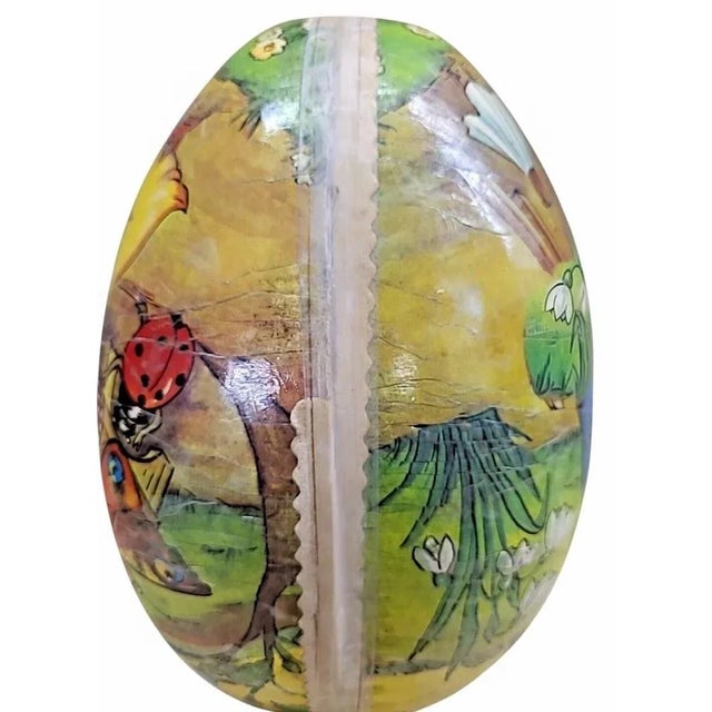 Charming extra-large German paper mâché Easter egg, dating to the 1940s–1950s, featuring a delightful lithographed...
