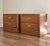 Authentic vintage Thomasville campaign-style nightstands featuring rich oak grain, distinctive architectural lines, and...